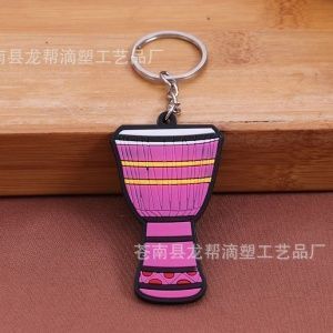 Брелок резиновый Африканский барабан. Цвет розовый.